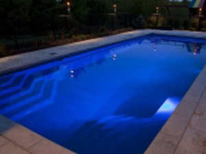 whitsunday-fiberglass-swimming-pool-with-blue-lights-at-night
